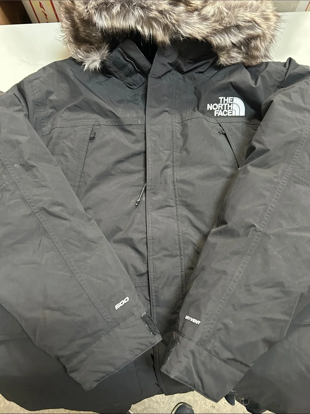 The North Face Black Men’s Insulated Puffer Jacket with Faux Fur Hood